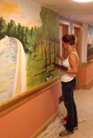 Sarah Hodgkins painting in a demential unit
