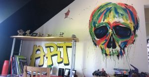 Graffiti style bedroom mural with skull
