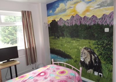 Image of African sunrise mural with lion