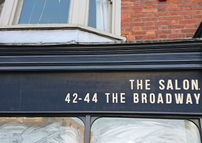 Bluebird hairdressers hand painted sign