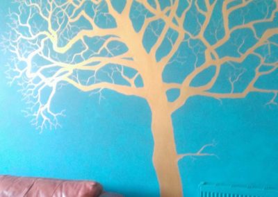 copper tree on teal background