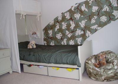 Image of boys army room with camouflage mural