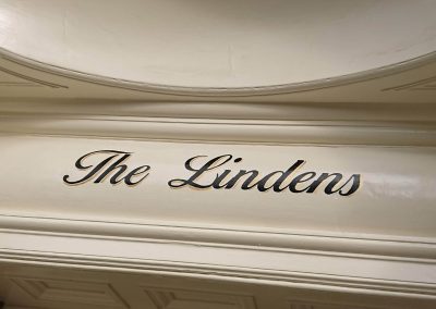 Image of hand painted hotel sign