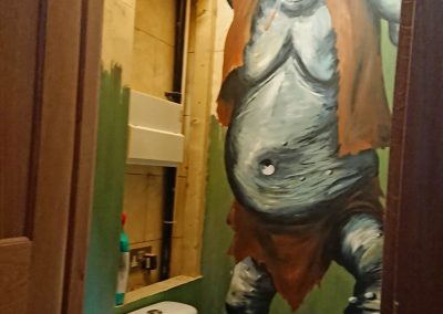 bathroom with troll mural