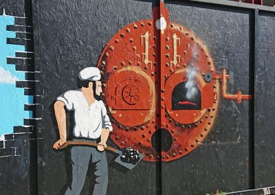 mural man stoking a boiler