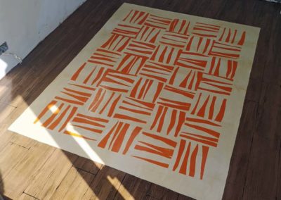 faux wooden floor with rug