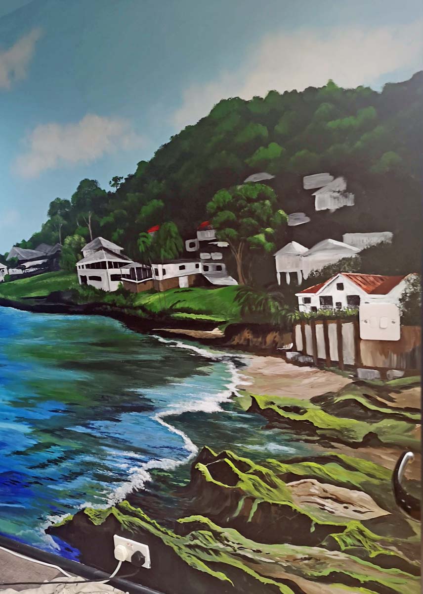 grenada mural under construction small Grand Anse Beach mural