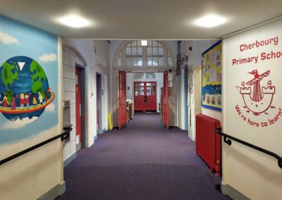 Diversity mural and logo in school entrance