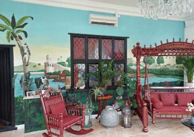 Tropical hand painted home mural in an Orangery
