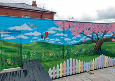 Garden mural with blossom tree
