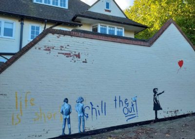 Banksy inspired garden mural