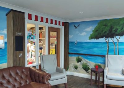 Care home mural with beach hut