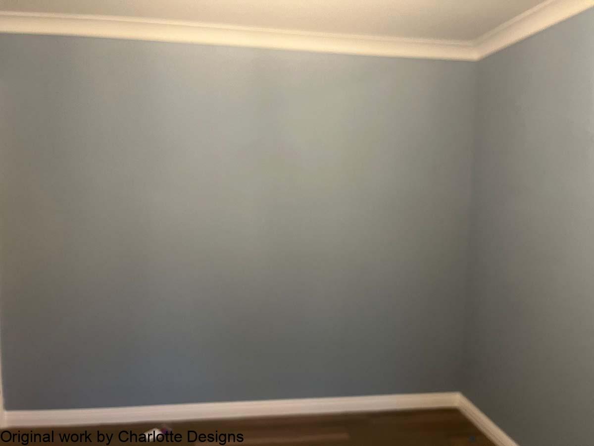 charlie before Blank wall before mural is painted