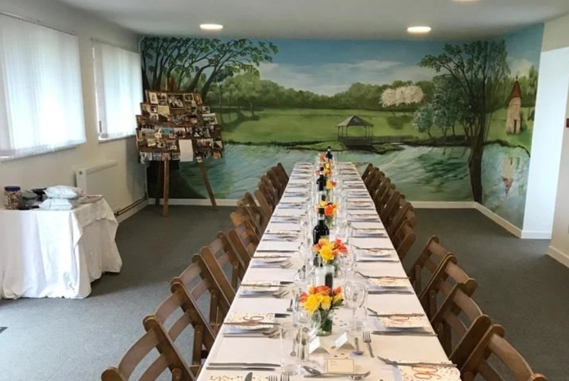 Furtho east ceremony room with mural set up for a party