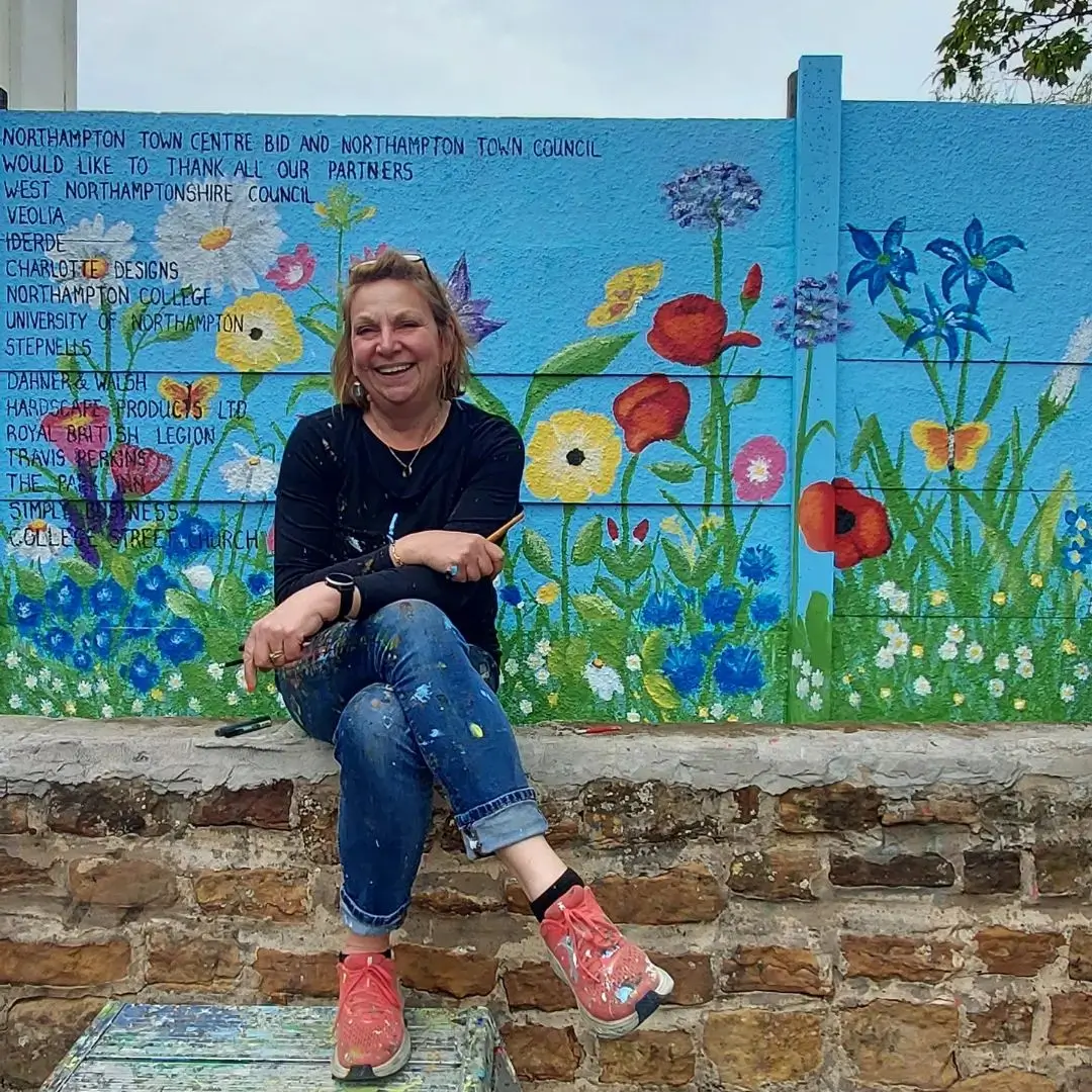Sarah Hodgkins mural artist at charlotte designs