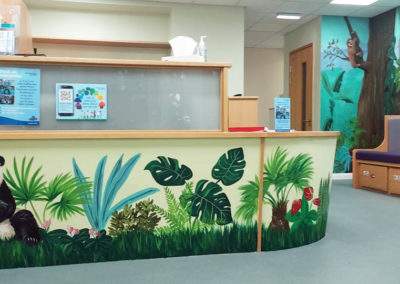 Jungle reception desk hand painted mural with panda