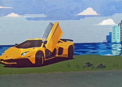 Yellow Lamborghini car mural for a hospital courtyard