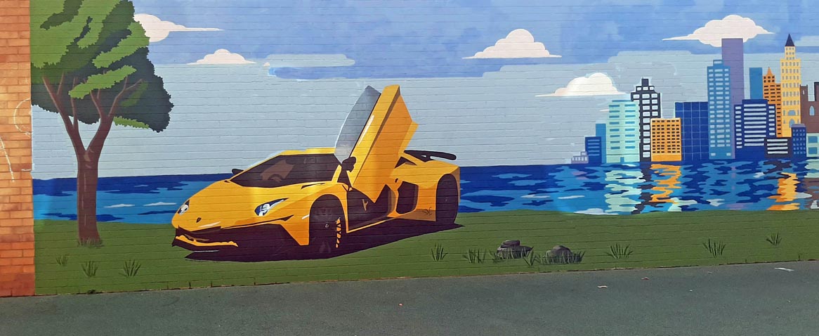 Yellow Lamborghini car mural for a hospital courtyard