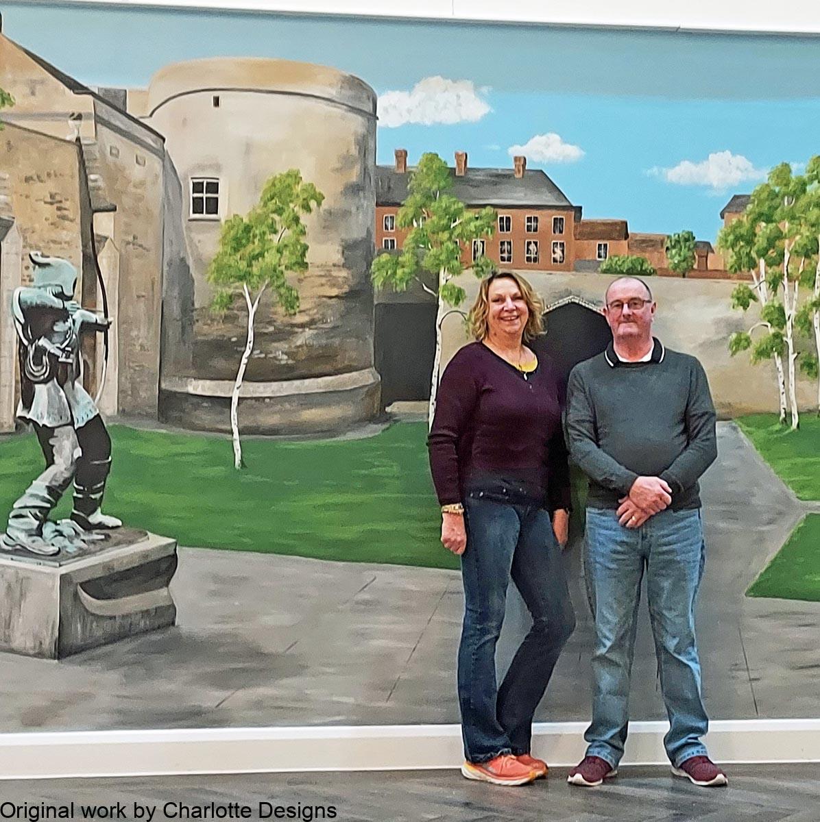 artist Sarah Hodgkins and Clive Morledge with Nottingham castle mural