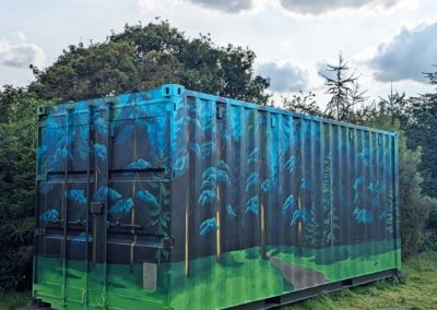 Woodland shipping container painted mural