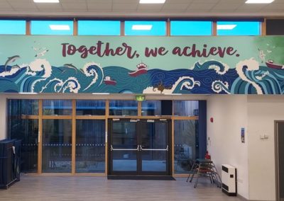 Primary school hall mural in Hastings with sea scape
