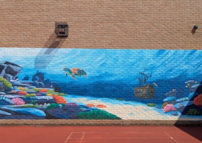 Undersea courtyard mural with turtle and shipwreck