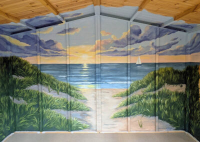 sunset beack mural with sand dunes and boat hand painted in a summer house